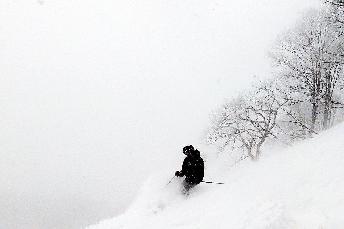 Luke skiing deep deep pow at Seki Onsen near Madarao Mountain