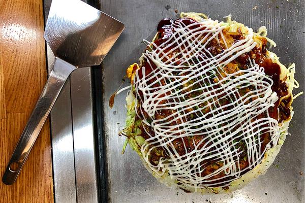 Okonomiyaki on a hotplate
